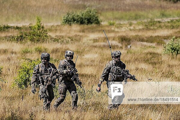 Soldiers of the Jägerbataillon 292 train a combat situation at the Bundeswehr Combat Training Centre in Letzlingen  11.07.2022. The soldiers wear AGDUS equipment (Ausbildungsgeraet Duellsimulator)  which can be used to simulate  document and analyse combat  Letzlingen  Germany  Europe