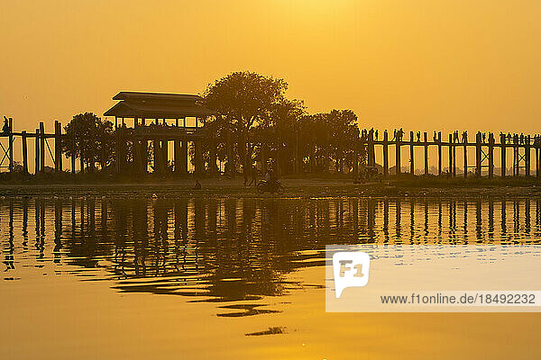 U Bein bridge over Taungthaman Lake at sunset  Amarapura  Mandalay  Myanmar (Burma)  Asia
