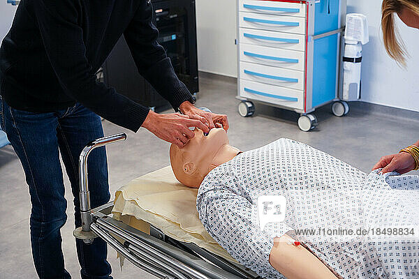 Resuscitation training on a dummy. Various health professionals are trained in the evolution of practices  care and emergency procedures within the Faculty of Medicine of Montpellier. They must work on serious cases of daily life faithfully reproduced on a SimMan dummy. Here  respiratory arrest on a man in his forties.