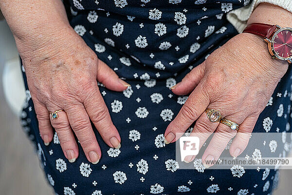 Senior hands and feet close-ups.