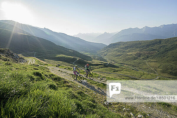 Elevated view of mountain bikers riding on uphill  Zillertal  Tyrol  Austria