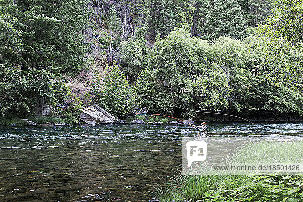 A fly fisherman on the North Umpqua River in Oregon.