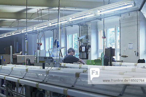 Mature woman working in the steel wool cleaner industry  Lahr  Baden-Wuerttemberg  Germany