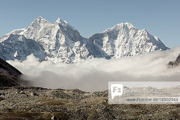 The mountains of the Everest Region are wrapped in clouds.