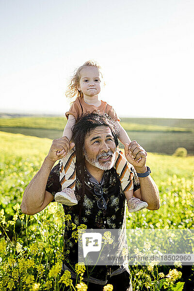 Uncle & Two Year Old Niece in Flower Field in San Diego