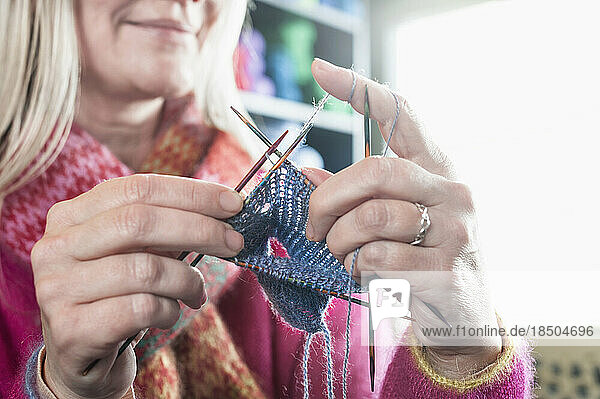 Close-up of a mature woman knitting muffler  Bavaria  Germany