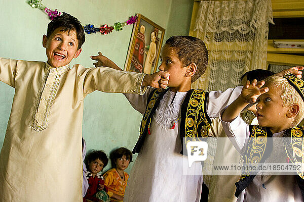 After nap time children do exercises at Habiba's child care in Kabul.