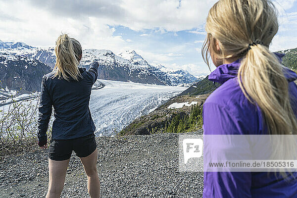 Two Trail Runners Observing Salmon Glacier