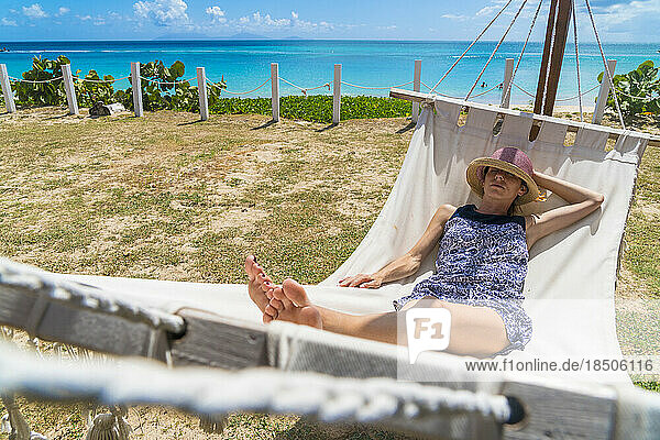 Front view of woman resting on hammock  Caribbean  Antilles