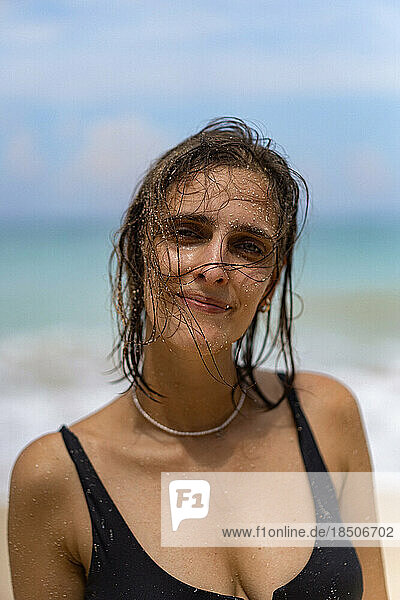 Portrait of a woman on the beach on vacation.