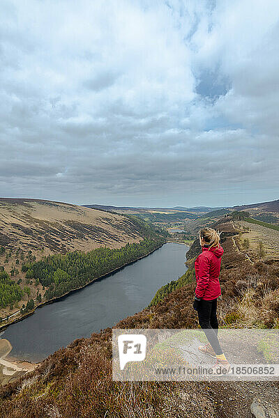 Woman traveler in the Spink Viewing Spot in Wicklow mountains