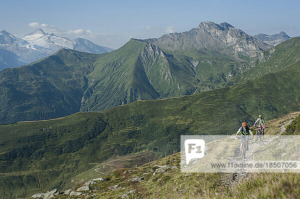 Mountain bikers riding on uphill  Zillertal  Tyrol  Austria