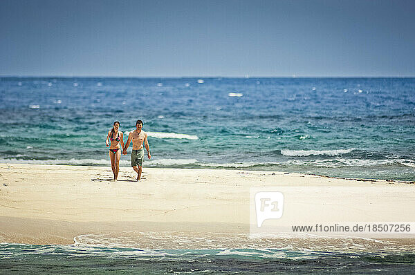 Couple on a remote beach.