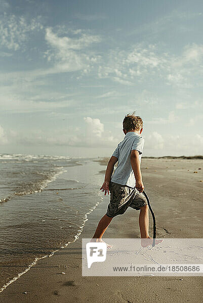 Boy Running Playing on Beach in Corpus Christi Texas