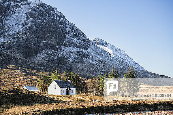 Lone white country house in the Scottish Highlands