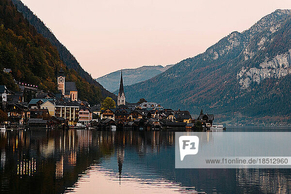Evening Hallstatt is surrounded by the Alps and the crystal waters