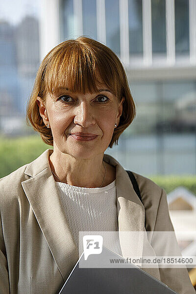 Mature businesswoman with brown hair