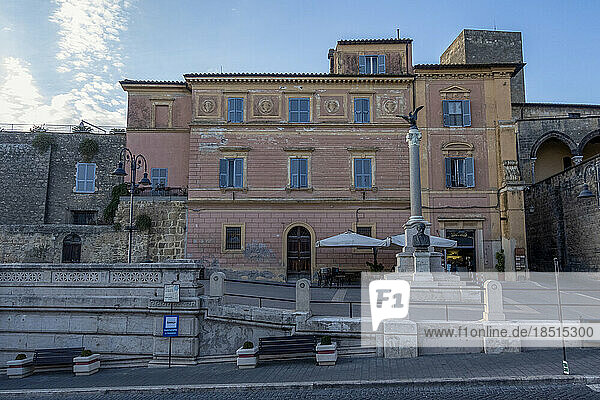 Italy  Lazio  Tarquinia  Monumento a Giuseppe Mazzini in front of residential building