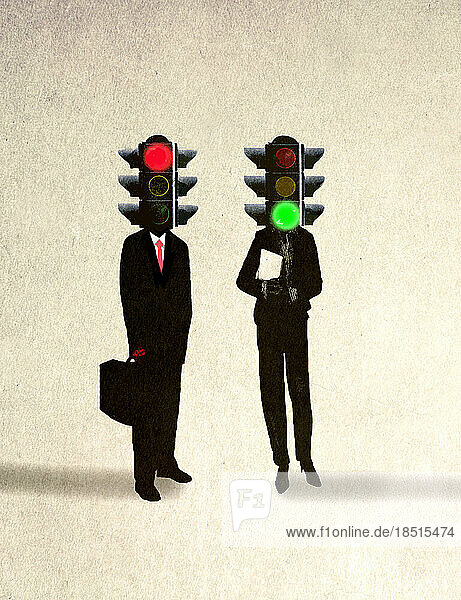Businessman and businesswoman with traffic signals on head against beige background