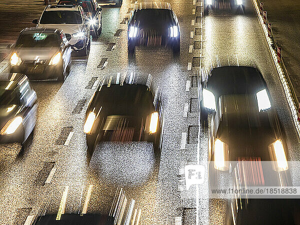Germany  Baden-Wurttemberg  Stuttgart  Blurred motion of traffic jam on multiple lane highway at night