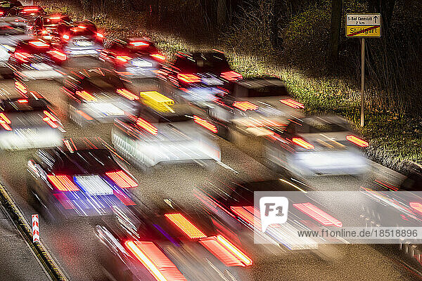 Germany  Baden-Wurttemberg  Stuttgart  Blurred motion of traffic jam on multiple lane highway at night