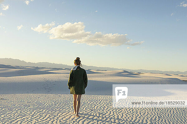 United States  New Mexico  White Sands National Park  Teenage girl walking
