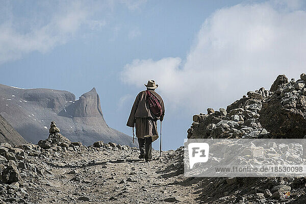 Pilgrim starting on the Kora pilgrimage at Mount Kailash; Tibetan Autonomous Region  Tibet
