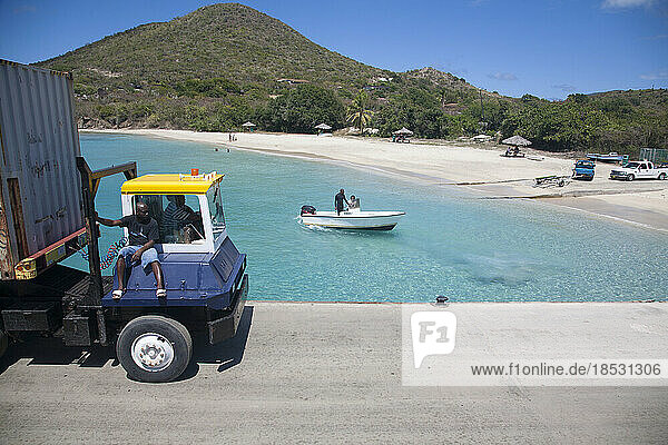 Boat and transport truck at the ferry terminal on Virgin Gorda in the Virgin Islands; Virgin Gorda  British Virgin Islands