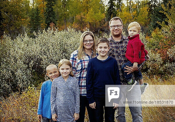 Portrait of a family of six in a park in autumn; Edmonton  Alberta  Canada