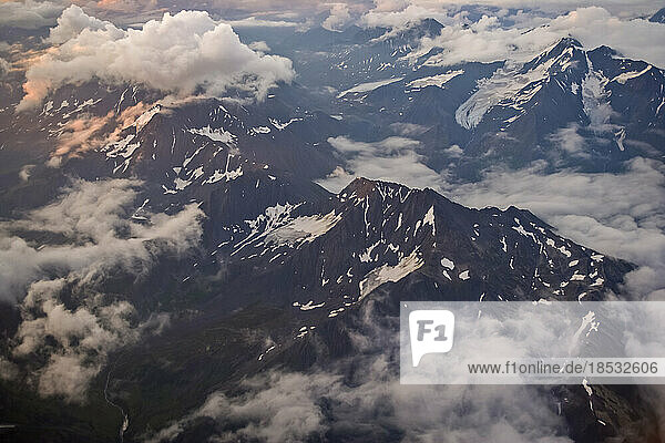 Clouds and the rugged peaks of the Chugach Mountains east of Anchorage  Alaska  USA; Alaska  United States of America