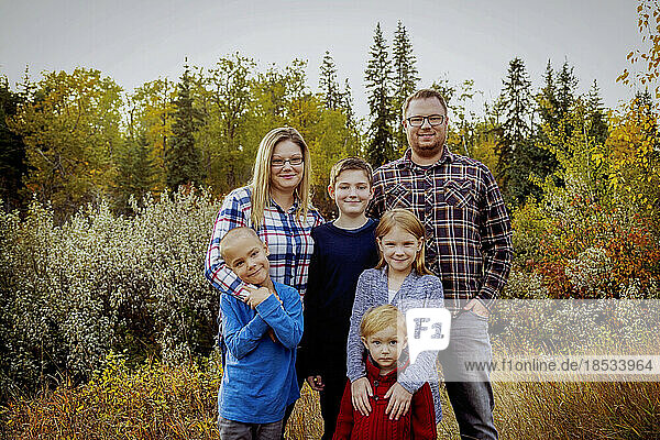 Portrait of a family of six in a park in autumn; Edmonton  Alberta  Canada