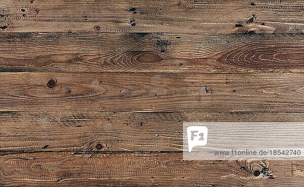 Rustikale Holzwand aus alten Holzbrettern  Hintergrundbild
