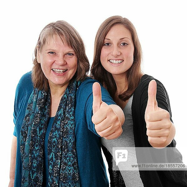 Mother and daughter give thumbs up