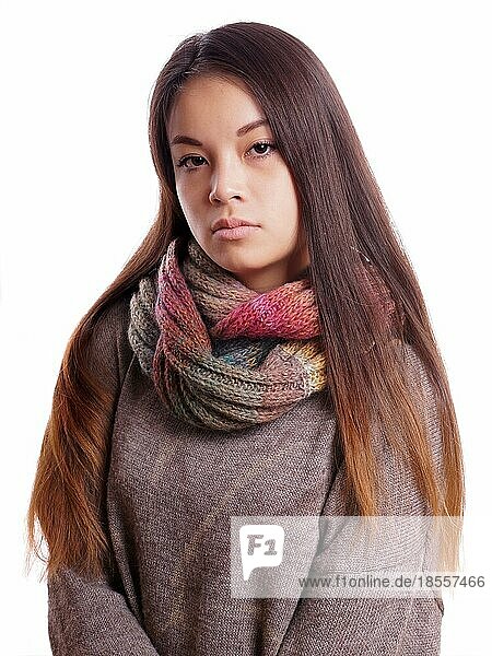 reserved young asian woman with neutral expression