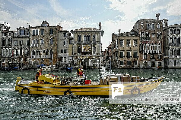 Postal boat of DHL parcel service on the Grand Canal  San Marco district  Venice  Veneto region  Italy  Europe