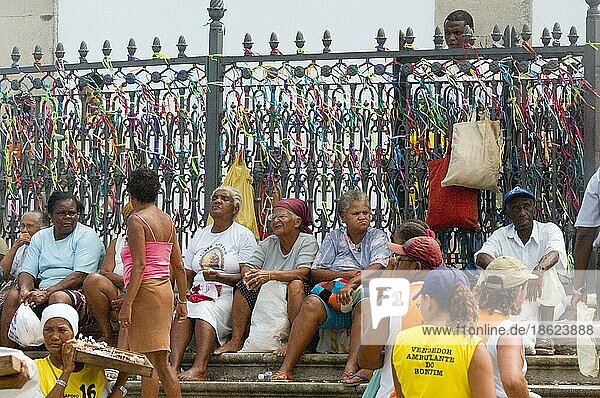Women selling fitas in front of Nosso Senhor do Bonfin Church  Salvador de Bahia  Brazil  lucky ribbons  South America