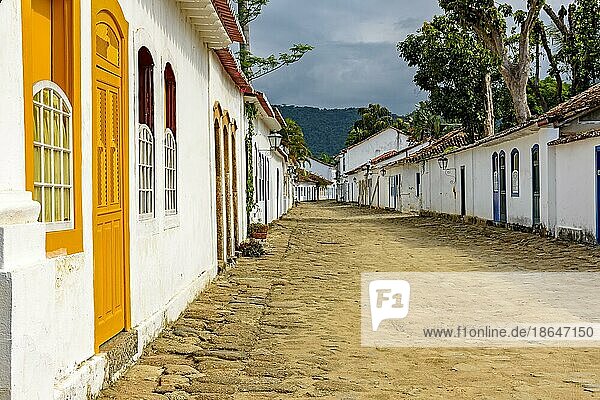 Streets of cobblestone and old houses in colonial style on the streets of the old and historic city of Paraty founded in the 17th century on the coast of the state of Rio de Janeiro  Brazil  Brasil  South America