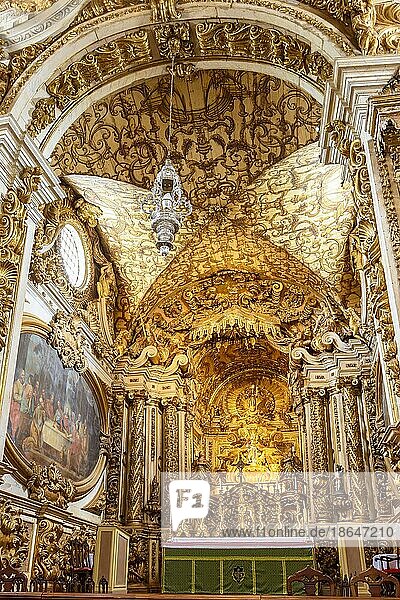 Interior and altar of a brazilian historic ancient church from the 18th century in baroque architecture with details of the walls in gold leaf in the city of Tiradentes  a UNESCO World Heritage Site  Minas Gerais State  Brazil  Brasil  South America