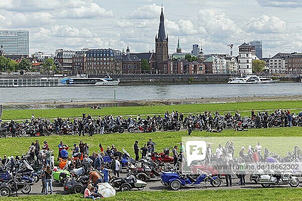 Motorbike meeting on the Düsseldorf Rhine meadows  Old Town panorama  Düsseldorf  Germany  Europe