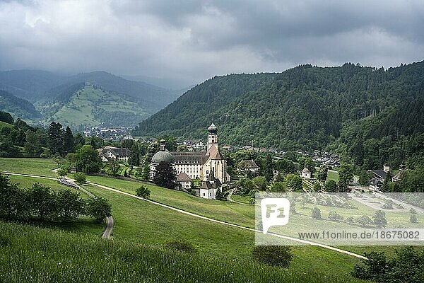 Thunderclouds pass over the Münstertal and the monastery of Sankt Trudpert  former Benedictine monastery  Münstertal  Black Forest  Baden-Württemberg  Germany  Europe