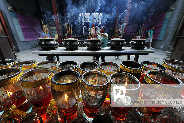 The Thien Hau Temple  the most famous Taoist temple in Cholon  red candles and incense sticks on joss stick pot burnt to pay respect to the Buddha  Ho Chi Minh City  Vietnam  Indochina  Southeast Asia  Asia