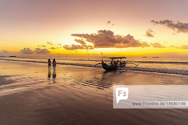 View of fishing outrigger on Kuta Beach at sunset  Kuta  Bali  Indonesia  South East Asia  Asia