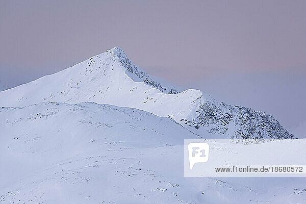 Skredfloget mountain peak at dusk in winter  Senja  Troms og Finnmark county  Norway  Scandinavia  Europe