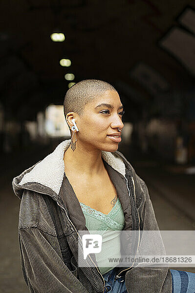 Hipster young woman with earphones