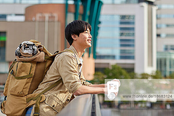 Young Japanese man travelling