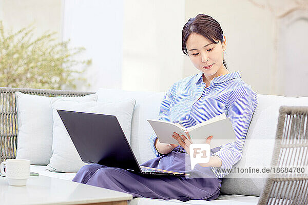 Japanese woman working on laptop