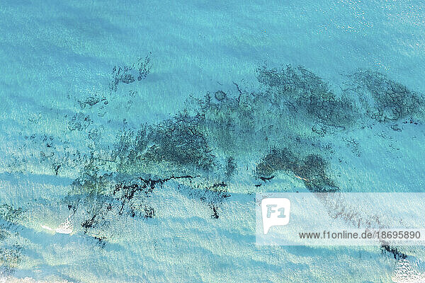 Spain  Balearic Islands  Formentera  Drone view of blue surface of Mediterranean Sea