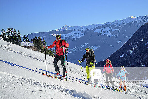 Austria  Tyrol  Group of skiers ascending snowcapped slope of Kellerjoch mountain