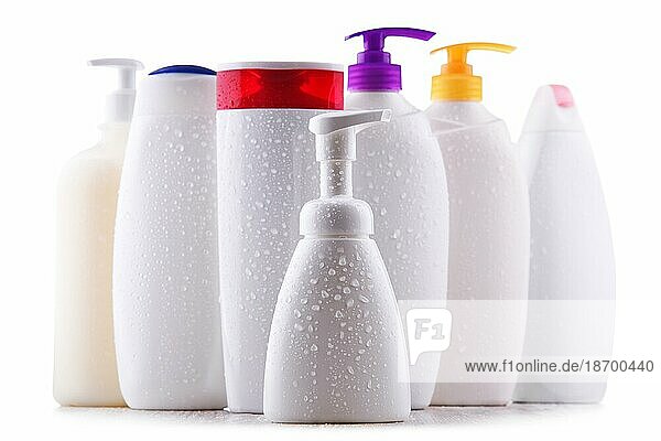 Plastic contaiers of shampoos and shower gels isolated on white background
