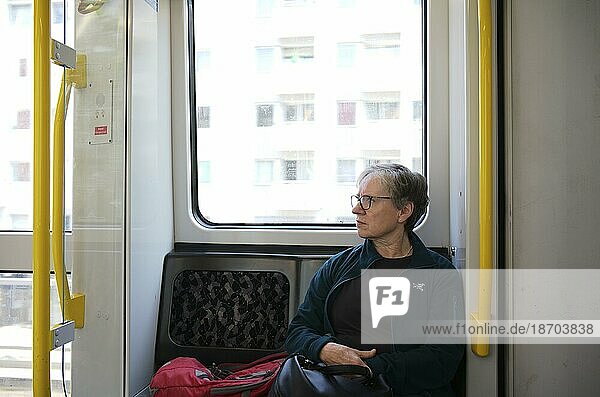 Elderly woman  passenger  riding in underground  BVG  Berliner Verkehrsbetriebe  Berlin  Germany  Europe